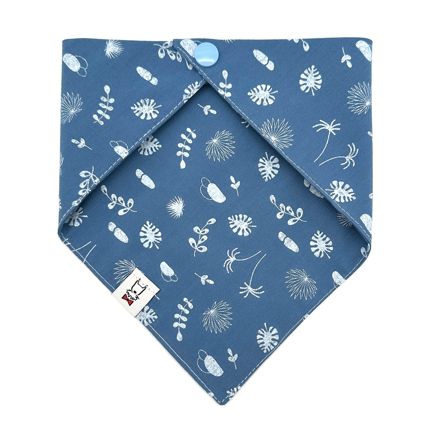 Blue fabric with white floral pattern on a white background