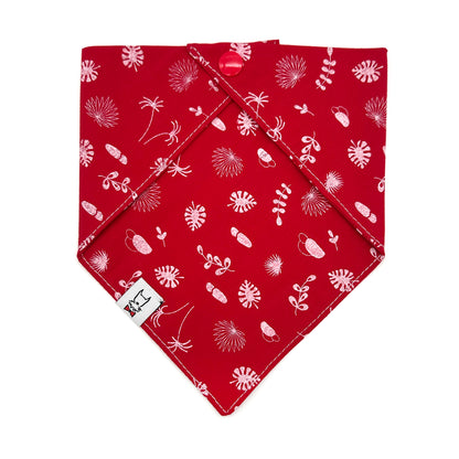 Red bandana with white floral pattern on a white background